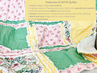 Floral yellow and pink girl rag quilt for sale, featuring soft fabric with a green accent. Available in sizes from toddler to throw and twin, this cozy quilt is perfect for girls&#39; bedding, offering warmth and style in a floral design