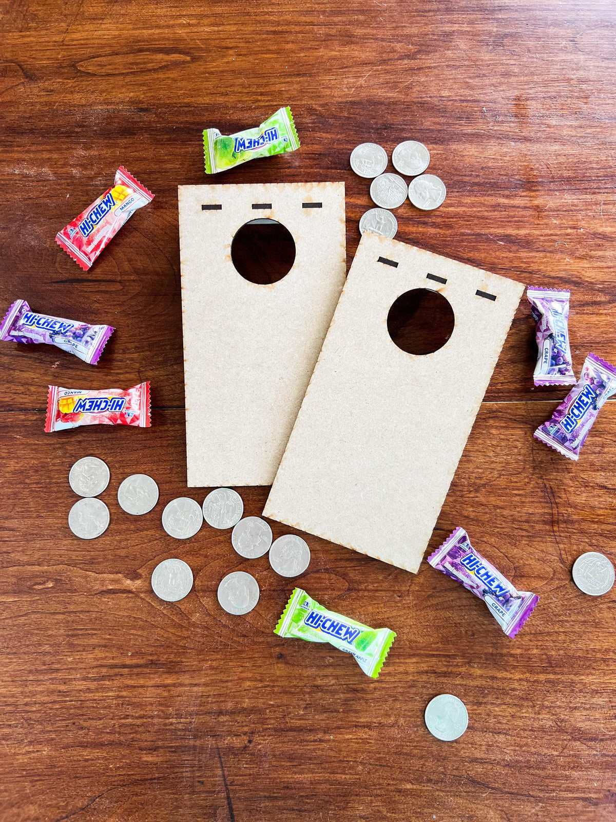 Mini wooden cornhole coin toss game board