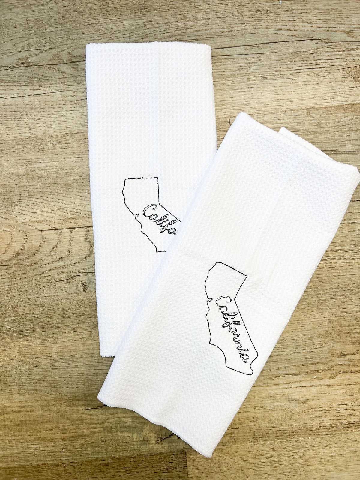 Embroidered state map kitchen towel