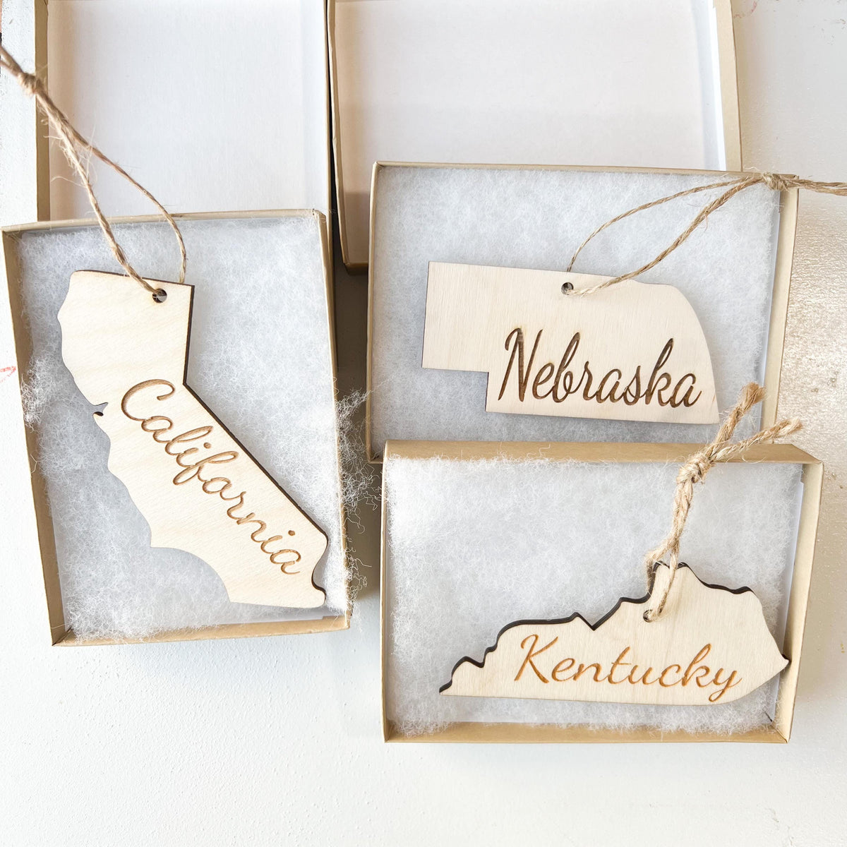 Set of wooden state Christmas ornaments