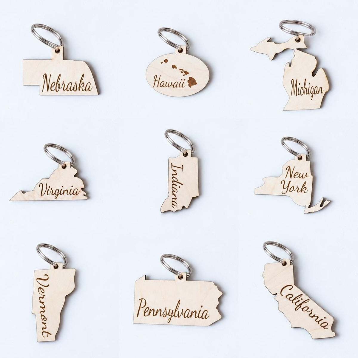 Wooden state shaped keychain on a metal key ring