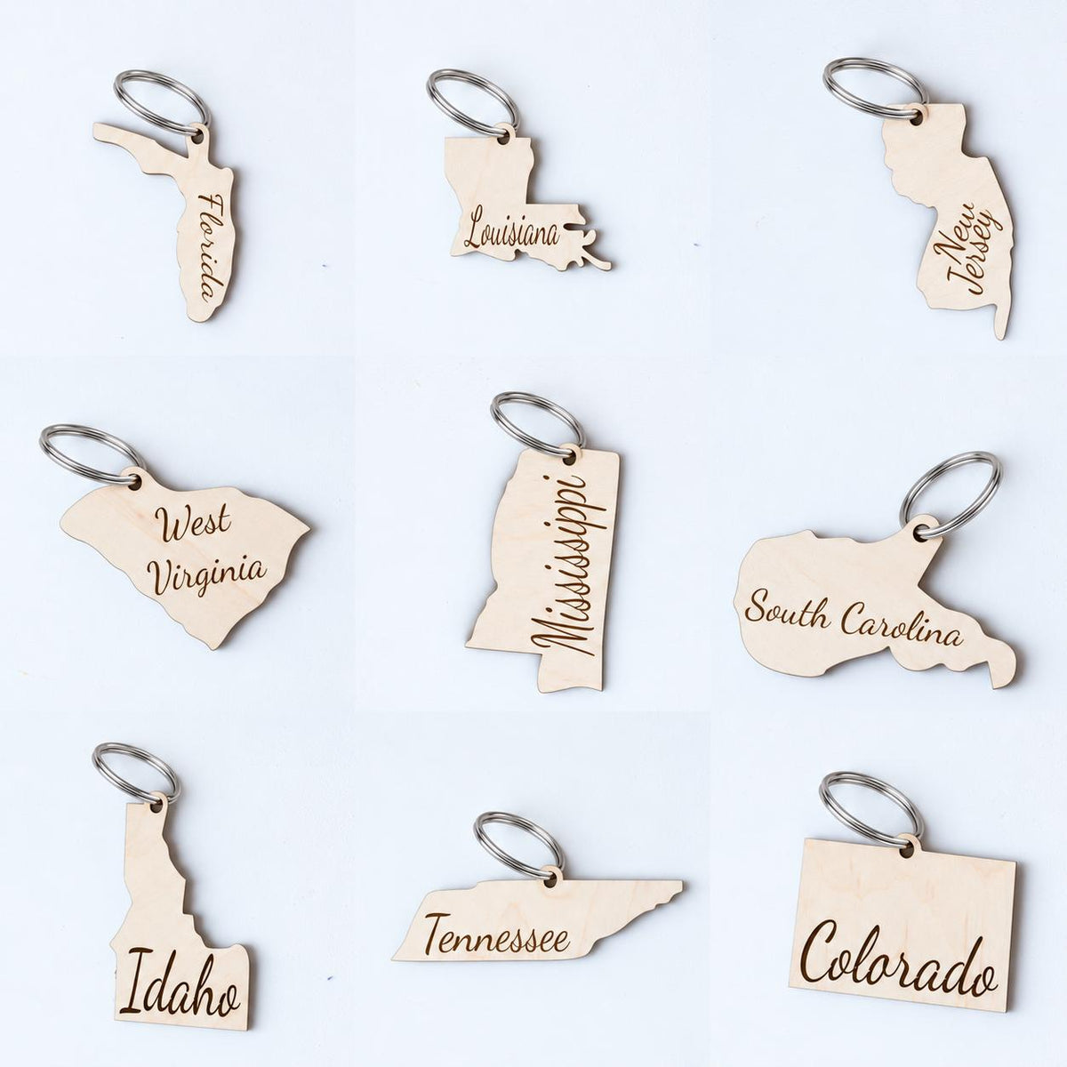 Wooden state shaped keychain on a metal key ring